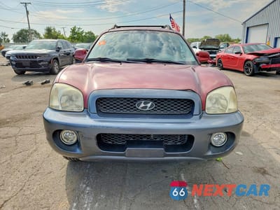 Piąte zdjęcie samochodu w środku: 2004 HYUNDAI SANTA FE GLS VIN:KM8SC13E84U700078 - miniatura