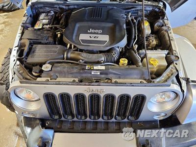 Zdjęcie 12 z 14 samochodu: 2016 JEEP WRANGLER UNLIMITED SAHARA VIN:1C4BJWEG1GL103791 - miniatura