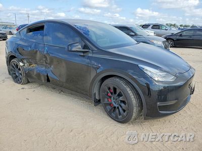 Czwarte zdjęcie samochodu z boku: 2021 TESLA MODEL Y VIN:5YJYGDEE7MF143142 - miniatura