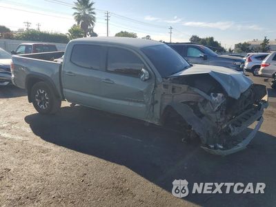 Czwarte zdjęcie samochodu z boku: 2023 TOYOTA TACOMA TRD OFF-ROAD VIN:3TMCZ5AN9PM633498 - miniatura