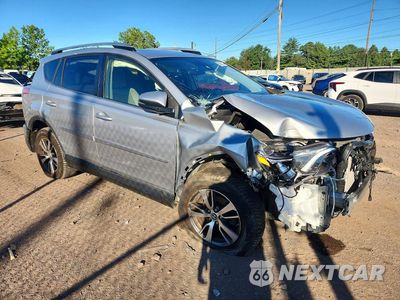 Czwarte zdjęcie samochodu z boku: 2018 TOYOTA RAV4 XLE VIN:JTMRFREV6JJ204750 - miniatura