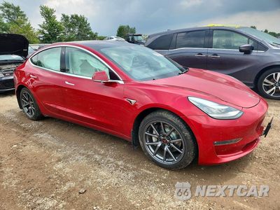 Czwarte zdjęcie samochodu z boku: 2018 TESLA MODEL 3 VIN:5YJ3E1EBXJF099654 - miniatura
