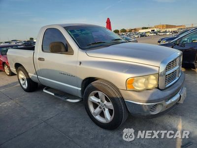 Czwarte zdjęcie samochodu z boku: 2002 DODGE RAM 1500 VIN:1D7HA16K42J207637 - miniatura