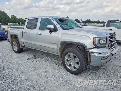 Czwarte zdjęcie samochodu z boku: 2018 GMC SIERRA K1500 SLT VIN:3GTU2NEC2JG590226 - miniatura