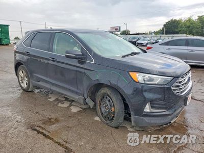 Czwarte zdjęcie samochodu z boku: 2019 FORD EDGE SEL VIN:2FMPK4J98KBB59083 - miniatura