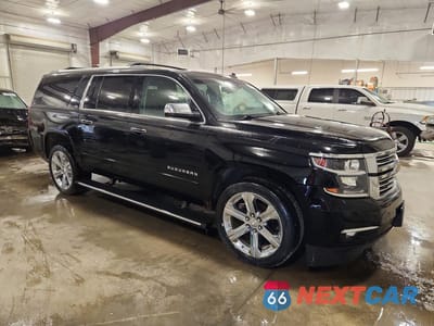 Czwarte zdjęcie samochodu z boku: 2015 CHEVROLET SUBURBAN K1500 LTZ VIN:1GNSKKKC7FR123294 - miniatura