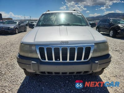 Piąte zdjęcie samochodu w środku: 2002 JEEP GRAND CHEROKEE LAREDO VIN:1J4GW48S72C249997 - miniatura