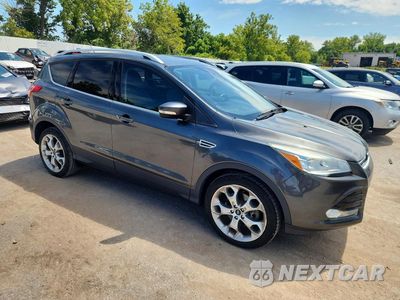 Czwarte zdjęcie samochodu z boku: 2016 FORD ESCAPE TITANIUM VIN:1FMCU0J90GUB84448 - miniatura