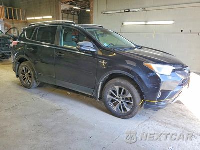 Czwarte zdjęcie samochodu z boku: 2017 TOYOTA RAV4 HYBRID XLE VIN:JTMRJREV9HD095790 - miniatura