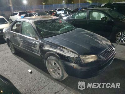 Czwarte zdjęcie samochodu z boku: 1999 TOYOTA AVALON LIMITED 4DR LE VIN:4T1BG22K1XU479428 - miniatura