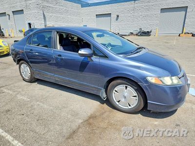 Czwarte zdjęcie samochodu z boku: 2007 HONDA CIVIC HYBRID VIN:JHMFA362X7S031965 - miniatura