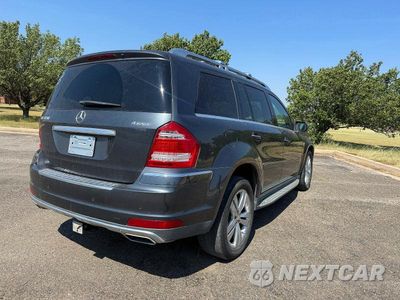 Czwarte zdjęcie samochodu z boku: 2010 MERCEDES-BENZ GL 450 4MATIC VIN:4JGBF7BE7AA612986 - miniatura