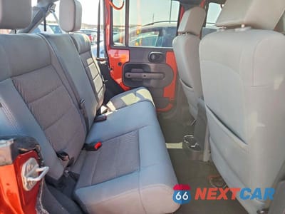 Zdjęcie 10 z 12 samochodu: 2009 JEEP WRANGLER UNLIMITED RUBICON VIN:1J4GA69199L769399 - miniatura