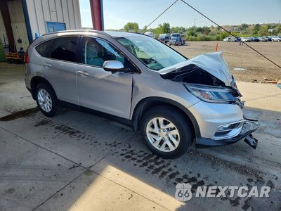 Czwarte zdjęcie samochodu z boku: 2015 HONDA CR-V EXL VIN:2HKRM4H70FH636398 - miniatura