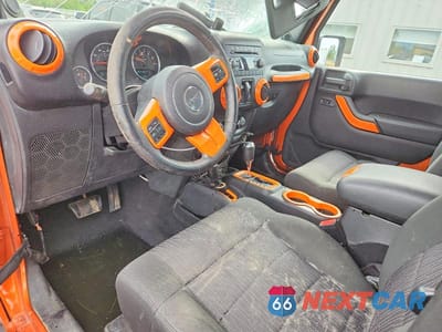 Zdjęcie 8 z 13 samochodu: 2011 JEEP WRANGLER SPORT VIN:1J4GA2D10BL625925 - miniatura