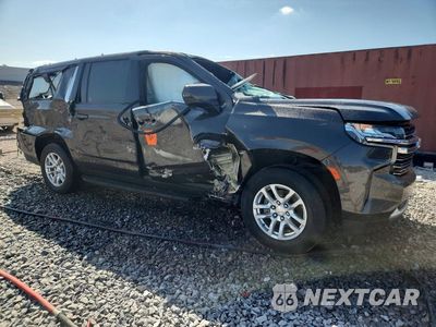 Czwarte zdjęcie samochodu z boku: 2021 CHEVROLET SUBURBAN C1500 LT VIN:1GNSCCKD1MR266976 - miniatura