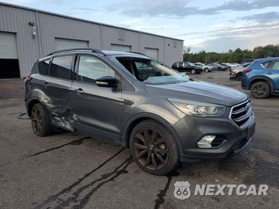 Czwarte zdjęcie samochodu z boku: 2017 FORD ESCAPE TITANIUM VIN:1FMCU0JD0HUC13307 - miniatura