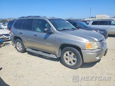Czwarte zdjęcie samochodu z boku: 2002 GMC ENVOY VIN:1GKDT13S322323255 - miniatura