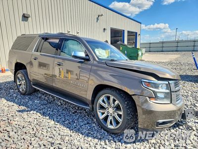 Czwarte zdjęcie samochodu z boku: 2016 CHEVROLET SUBURBAN K1500 LTZ VIN:1GNSKJKC6GR166147 - miniatura