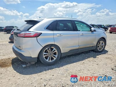 Trzecie zdjęcie samochodu z tyłu: 2019 FORD EDGE SEL VIN:2FMPK3J95KBC35191 - miniatura