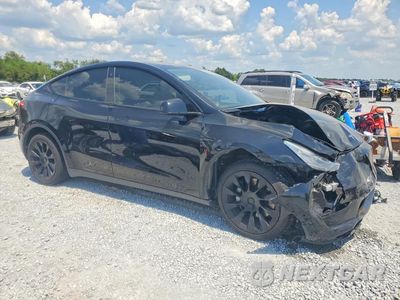 Czwarte zdjęcie samochodu z boku: 2021 TESLA MODEL Y UNKNOWN VIN:5YJYGDEE0MF203732 - miniatura