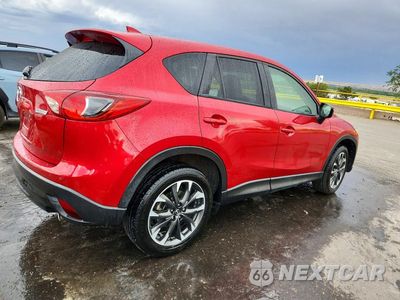 Trzecie zdjęcie samochodu z tyłu: 2016 MAZDA CX-5 GT VIN:JM3KE4DY4G0828328 - miniatura