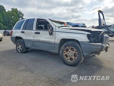 Czwarte zdjęcie samochodu z boku: 2002 JEEP GRAND CHEROKEE LAREDO VIN:1J4GW48S82C328479 - miniatura
