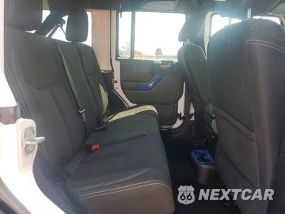 Zdjęcie 11 z 13 samochodu: 2016 JEEP WRANGLER UNLIMITED SAHARA VIN:1C4BJWEG8GL171733 - miniatura