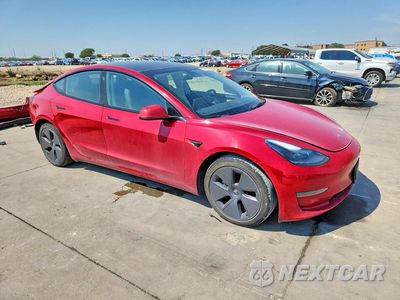 Czwarte zdjęcie samochodu z boku: 2023 TESLA MODEL 3 VIN:5YJ3E1EA0PF448322 - miniatura