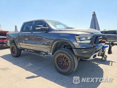 Czwarte zdjęcie samochodu z boku: 2019 RAM 1500 REBEL VIN:1C6SRFLTXKN883013 - miniatura
