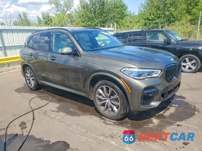 Czwarte zdjęcie samochodu z boku: 2023 BMW X5 XDRIVE45E VIN:5UXTA6C09P9P83302 - miniatura