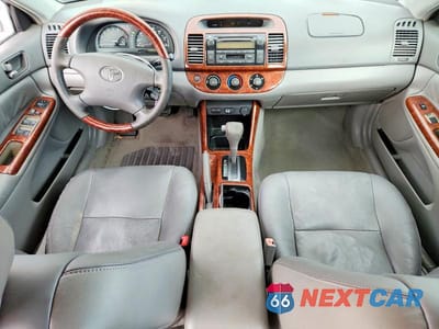 Zdjęcie 8 z 13 samochodu: 2003 TOYOTA CAMRY LE VIN:4T1BE32K93U717418 - miniatura