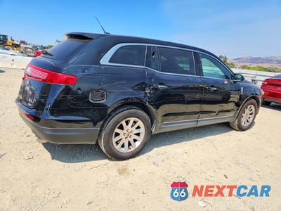 Trzecie zdjęcie samochodu z tyłu: 2018 LINCOLN MKT VIN:2LMHJ5NK0JBL01942 - miniatura