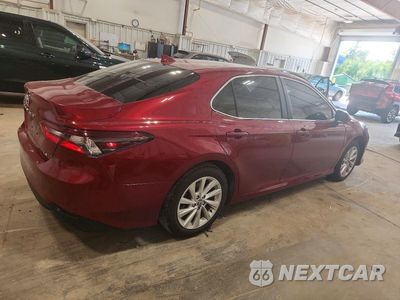 Trzecie zdjęcie samochodu z tyłu: 2021 TOYOTA CAMRY LE VIN:4T1C11AK1MU580157 - miniatura