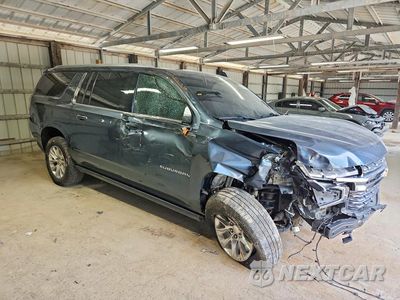 Czwarte zdjęcie samochodu z boku: 2021 CHEVROLET SUBURBAN K1500 PREMIER VIN:1GNSKFKDXMR306282 - miniatura