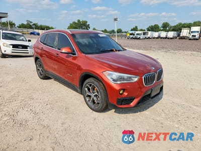 Czwarte zdjęcie samochodu z boku: 2018 BMW X1 SDRIVE28I VIN:WBXHU7C3XJ5H45516 - miniatura