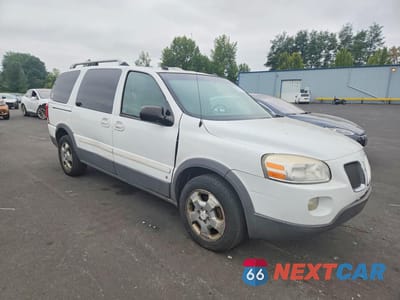 Czwarte zdjęcie samochodu z boku: 2006 PONTIAC MONTANA SV6 VIN:1GMDX33L16D150619 - miniatura