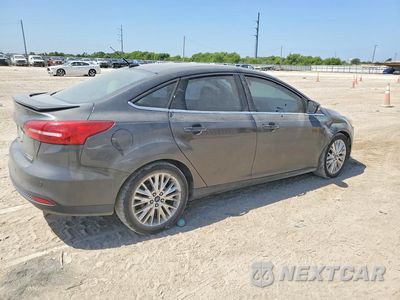 Trzecie zdjęcie samochodu z tyłu: 2015 FORD FOCUS TITANIUM VIN:1FADP3J23FL328041 - miniatura
