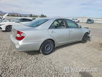 Trzecie zdjęcie samochodu z tyłu: 2002 TOYOTA CAMRY LE VIN:JTDBE30K120107672 - miniatura