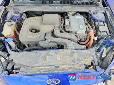 Zdjęcie 11 z 12 samochodu: 2016 FORD FUSION SE HYBRID VIN:3FA6P0LU7GR388235 - miniatura