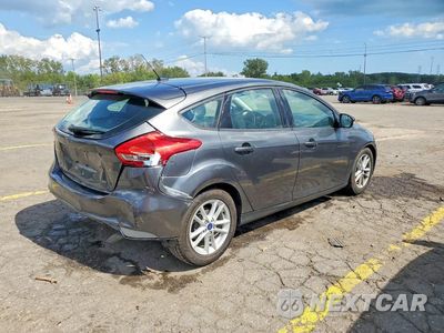 Trzecie zdjęcie samochodu z tyłu: 2018 FORD FOCUS SE VIN:1FADP3K23JL222163 - miniatura