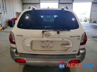 Zdjęcie 6 z 13 samochodu: 2004 HYUNDAI SANTA FE GLS VIN:KM8SC73D64U722283 - miniatura