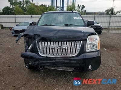 Piąte zdjęcie samochodu w środku: 2007 GMC YUKON DENALI VIN:1GKFK63857J337054 - miniatura