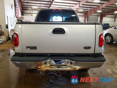 Zdjęcie 6 z 12 samochodu: 2002 FORD F150 SUPERCREW VIN:1FTRW08L72KC57300 - miniatura