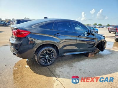 Trzecie zdjęcie samochodu z tyłu: 2019 BMW X6 SDRIVE35I VIN:5UXKU0C58K0H98773 - miniatura