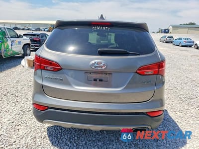 Zdjęcie 6 z 13 samochodu: 2016 HYUNDAI SANTA FE SPORT 2.4L VIN:5XYZT3LBXGG342007 - miniatura