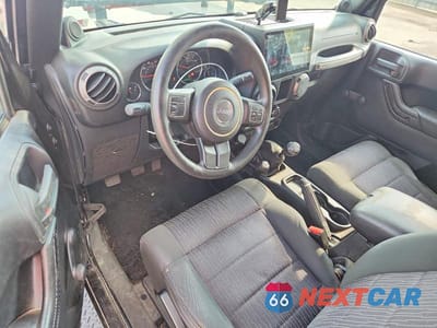 Zdjęcie 8 z 14 samochodu: 2012 JEEP WRANGLER SPORT VIN:1C4AJWAG1CL110736 - miniatura