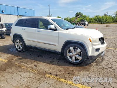 Czwarte zdjęcie samochodu z boku: 2011 JEEP GRAND CHEROKEE OVERLAND VIN:1J4RR6GT7BC560870 - miniatura