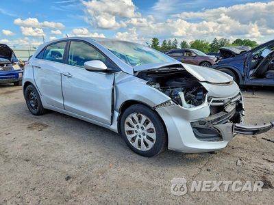 Czwarte zdjęcie samochodu z boku: 2016 HYUNDAI ELANTRA GT BASE VIN:KMHD35LH7GU281025 - miniatura