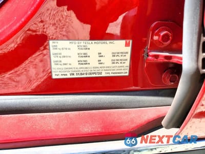 Zdjęcie 12 z 12 samochodu: 2014 TESLA MODEL S VIN:5YJSA1S12EFP57282 - miniatura